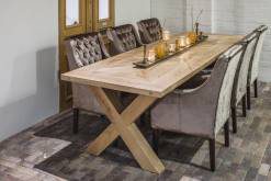 Dining table with X-frame and candle decoration