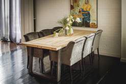 Wood and metal dining table in a living setting
