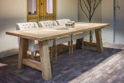 Wooden dining table with striking A-shaped legs