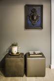 Two upholstered footstools as a stylish surface