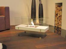 Aero designer fireplace with an open flame in the living room